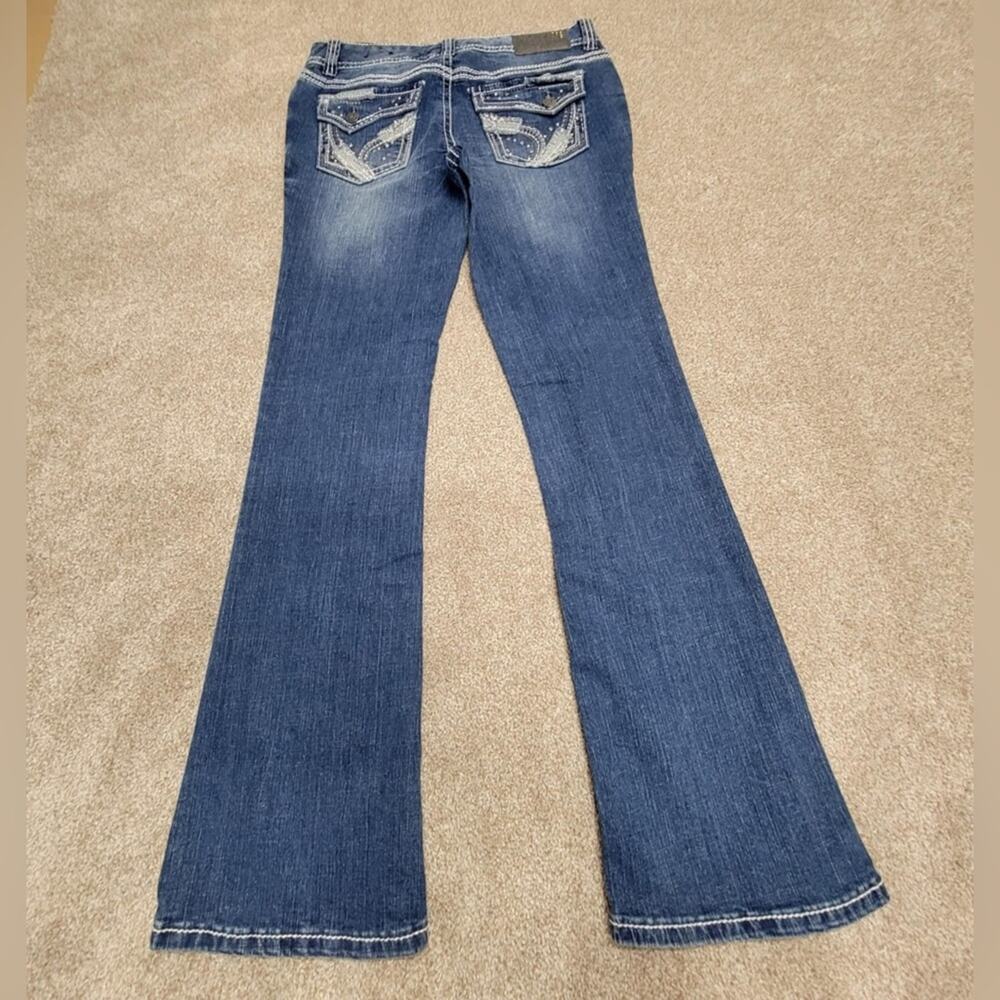 Y2K 2000s indie sleaze grunge Ariya jean bootcut denim 9/10 low rise medium wash